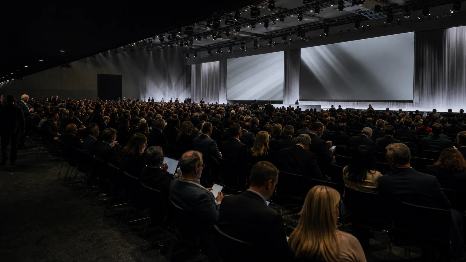 A major corporate event viewed from a full auditorium